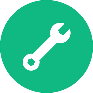 White wrench icon on a green circular background.